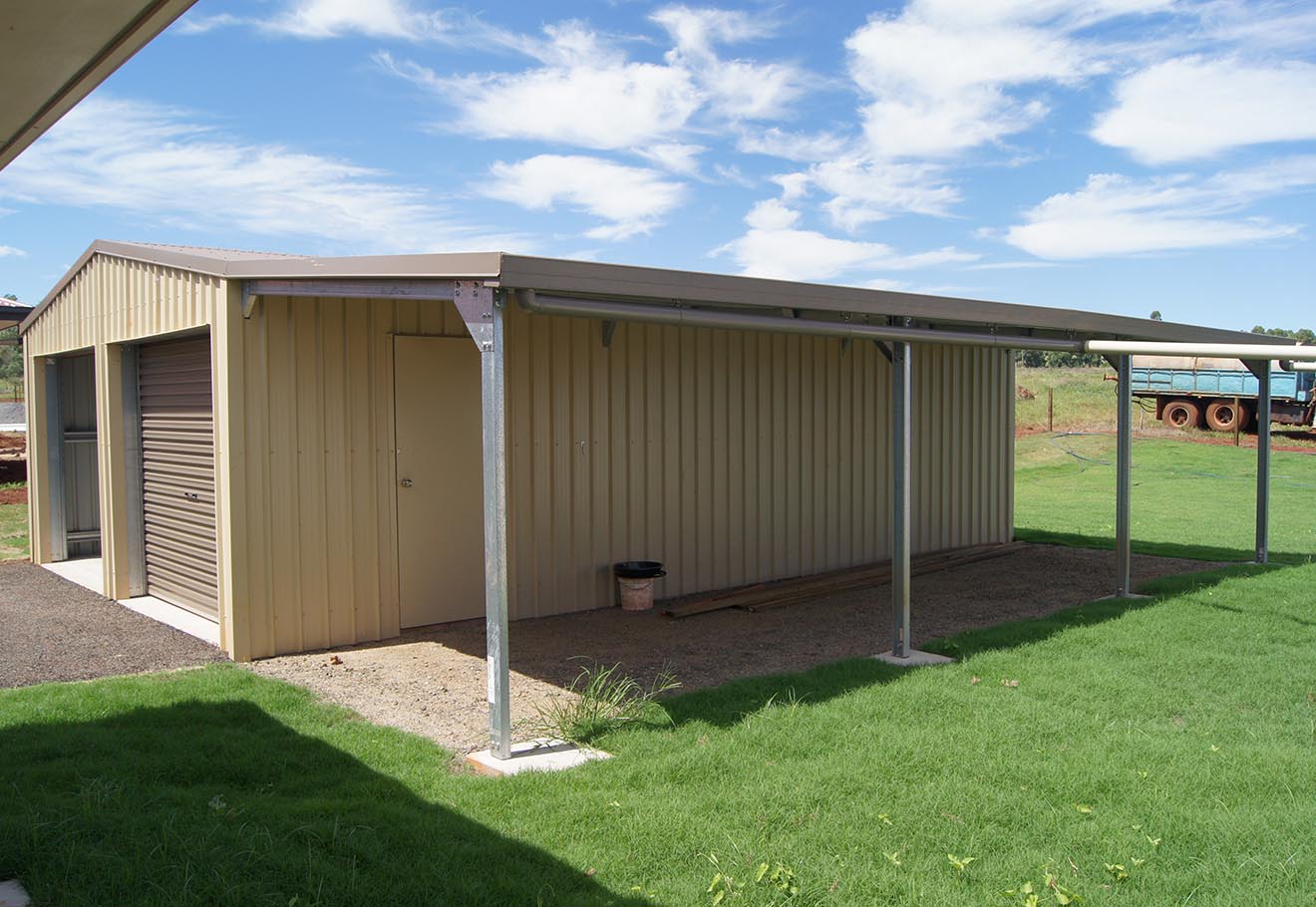 Two door shed with carport section