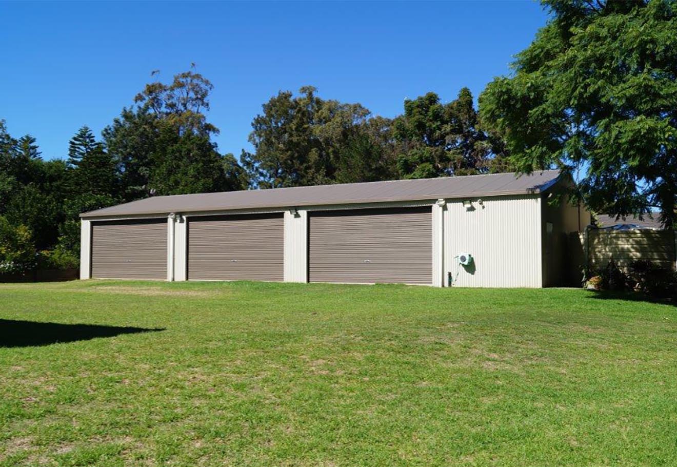 Three door residential shed