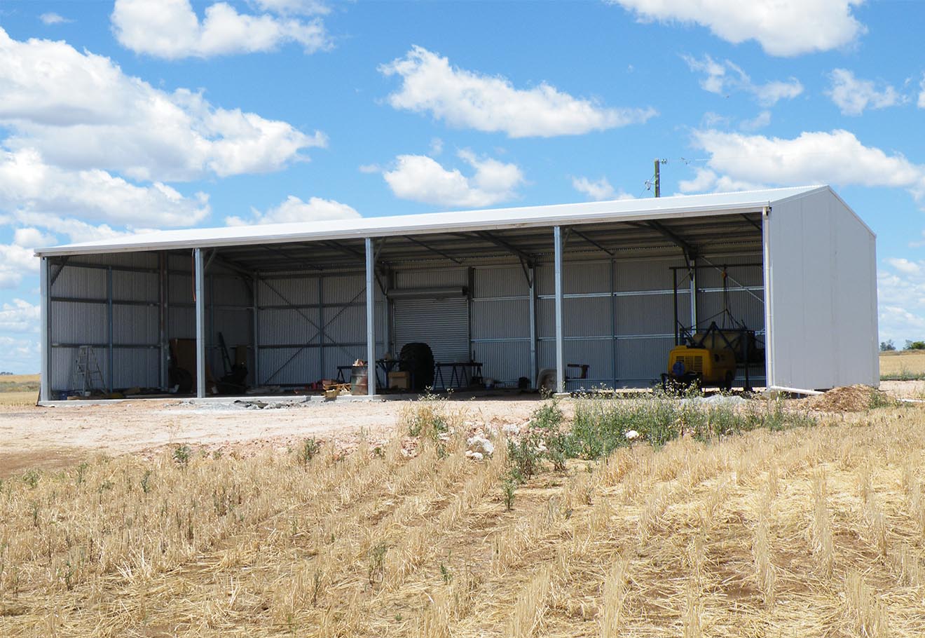 Rural gable-roof shed for storing machinery